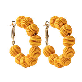 Yellow woven ball hoop earrings